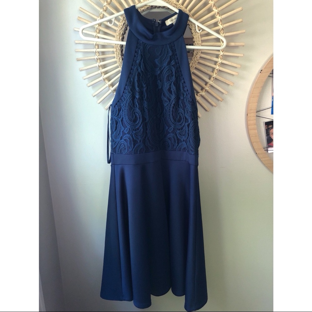 Francesca’s A-line back zip up dress; beautiful embroidery and close neckline